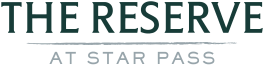 A sign that says "The Reserve at Star Pass".